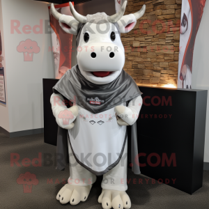 Silver Hereford Cow mascot costume character dressed with a Turtleneck and Scarves