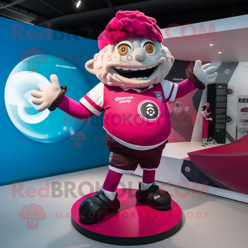 Magenta Gyro mascot costume character dressed with a Rugby Shirt and Foot pads Magenta Gyro mascot costume character dressed with a Rugby Shirt and Foot pads
