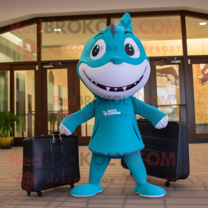 Teal Barracuda mascot costume character dressed with a Yoga Pants and Briefcases