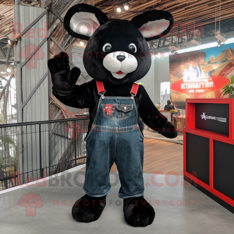Black Rabbit mascot costume character dressed with a Jeans and Gloves Black Rabbit mascot costume character dressed with a Jeans and Gloves
