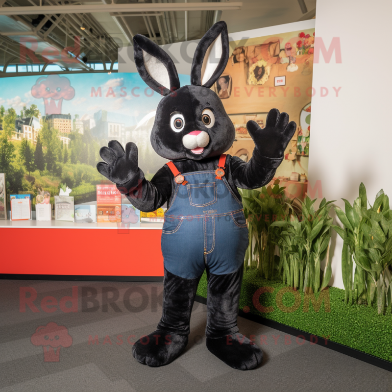 Black Rabbit mascot costume character dressed with a Jeans and Gloves Black Rabbit mascot costume character dressed with a Jeans and Gloves