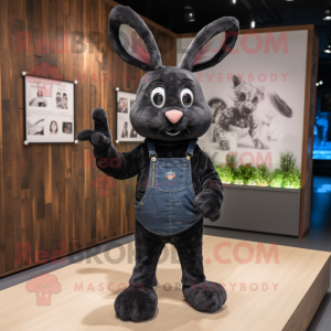 Black Rabbit mascot costume character dressed with a Jeans and Gloves