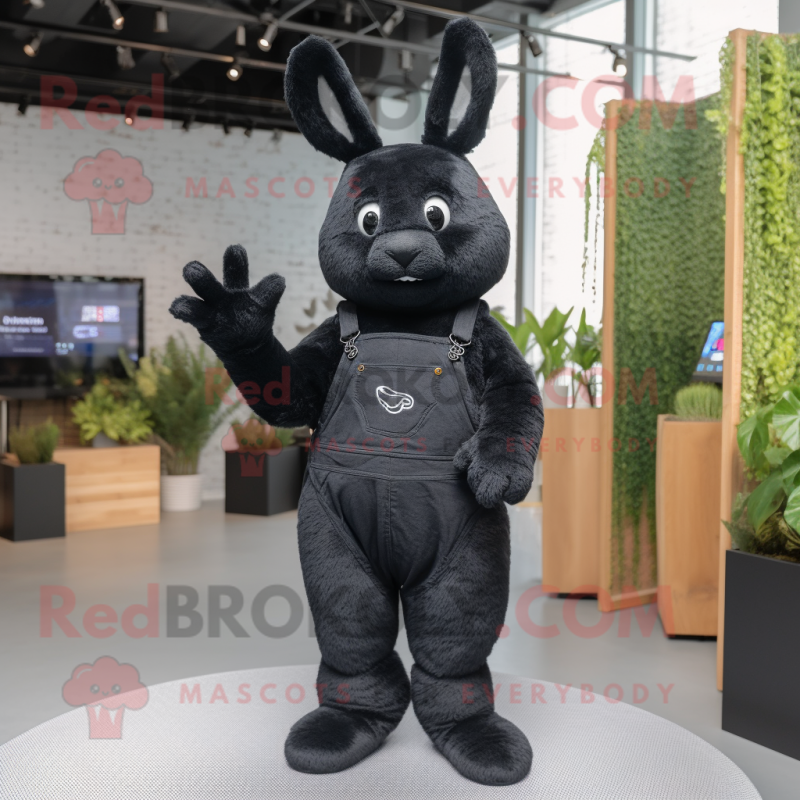 Black Rabbit mascot costume character dressed with a Jeans and Gloves