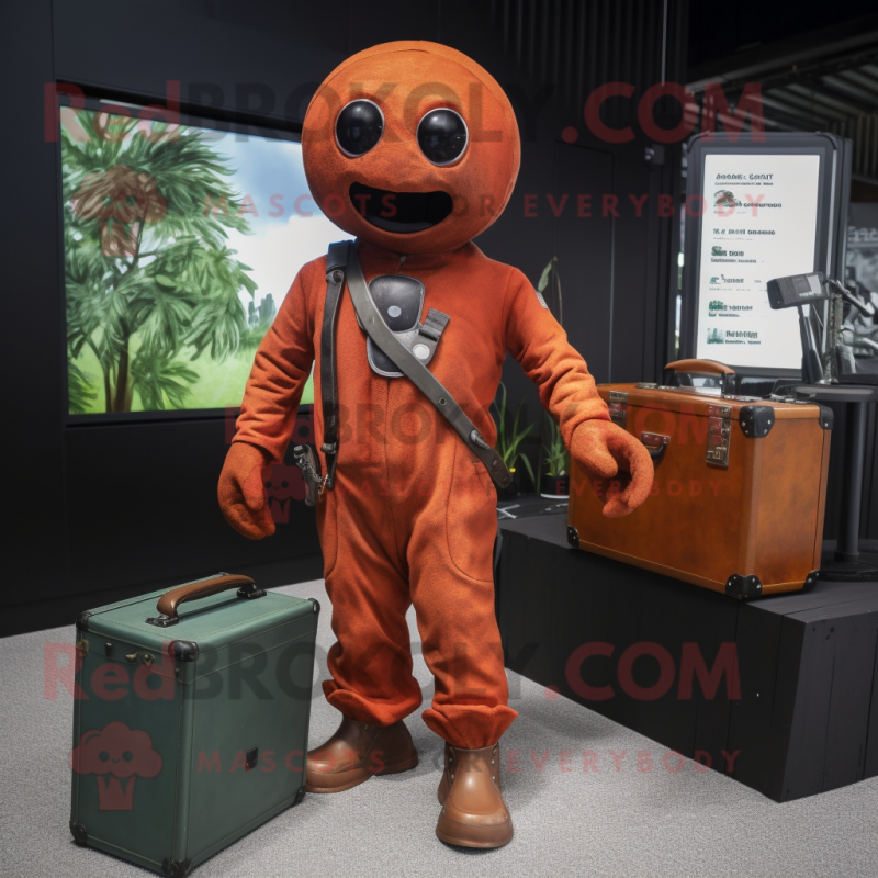 Rust Computer mascot costume character dressed with a Jumpsuit and Briefcases