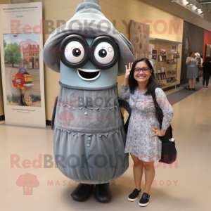Gray Enchiladas mascot costume character dressed with a Mini Dress and Eyeglasses