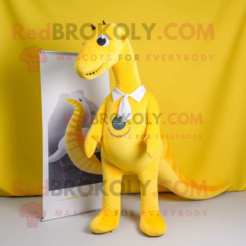Yellow Diplodocus mascot costume character dressed with a Leggings and Pocket squares