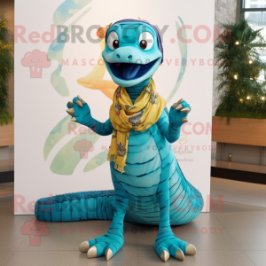 Turquoise Python mascot costume character dressed with a Chinos and Scarf clips
