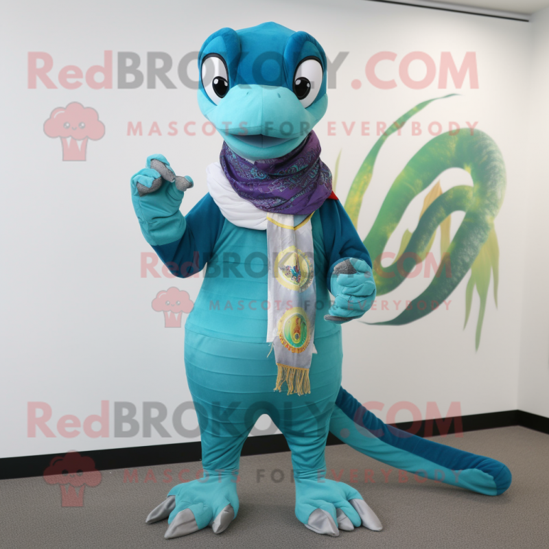 Turquoise Python mascot costume character dressed with a Chinos and Scarf clips