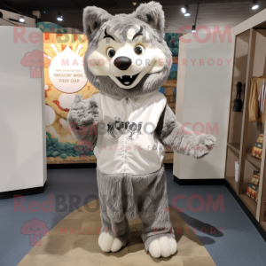 Silver Say Wolf mascot costume character dressed with a Hoodie and Messenger bags