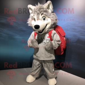 Silver Say Wolf mascot costume character dressed with a Hoodie and Messenger bags