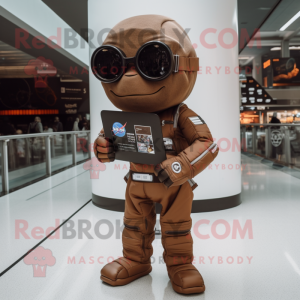 Brown Astronaut mascot costume character dressed with a Oxford Shirt and Reading glasses