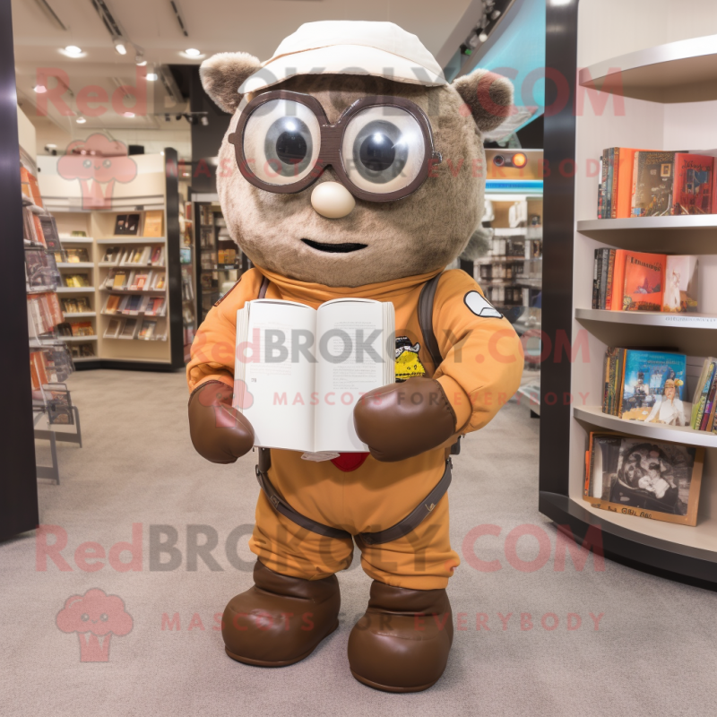 Brown Astronaut mascot costume character dressed with a Oxford Shirt and Reading glasses