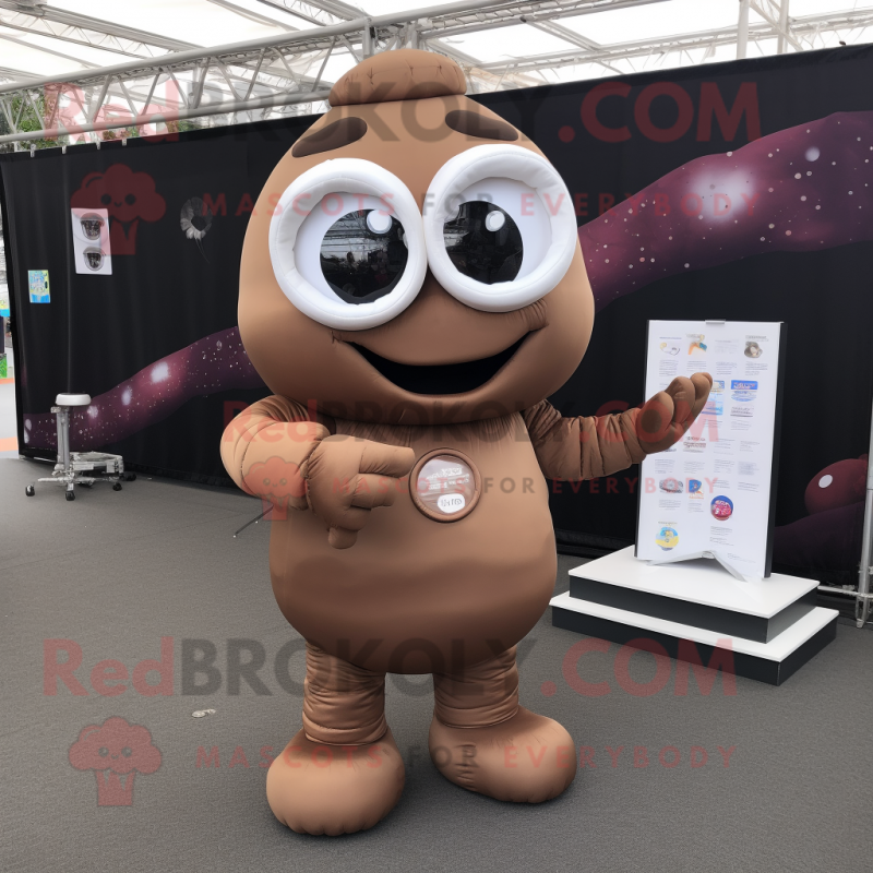 Brown Astronaut mascot costume character dressed with a Oxford Shirt and Reading glasses Brown Astronaut mascot costume character dressed with a Oxford Shirt and Reading glasses