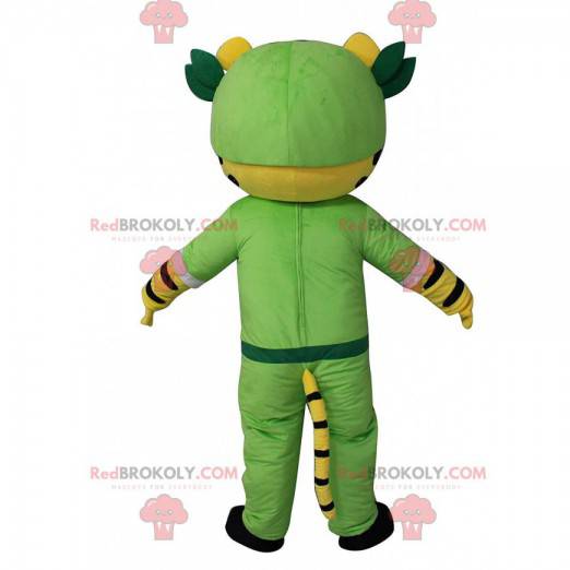 Yellow, white and black tiger mascot in adventurer outfit -