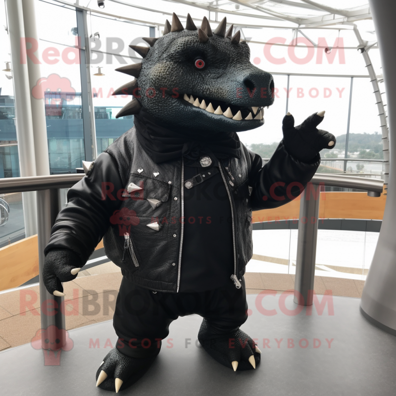 Black Ankylosaurus mascot costume character dressed with a Leather Jacket and Shawl pins Black Ankylosaurus mascot costume character dressed with a Leather Jacket and Shawl pins