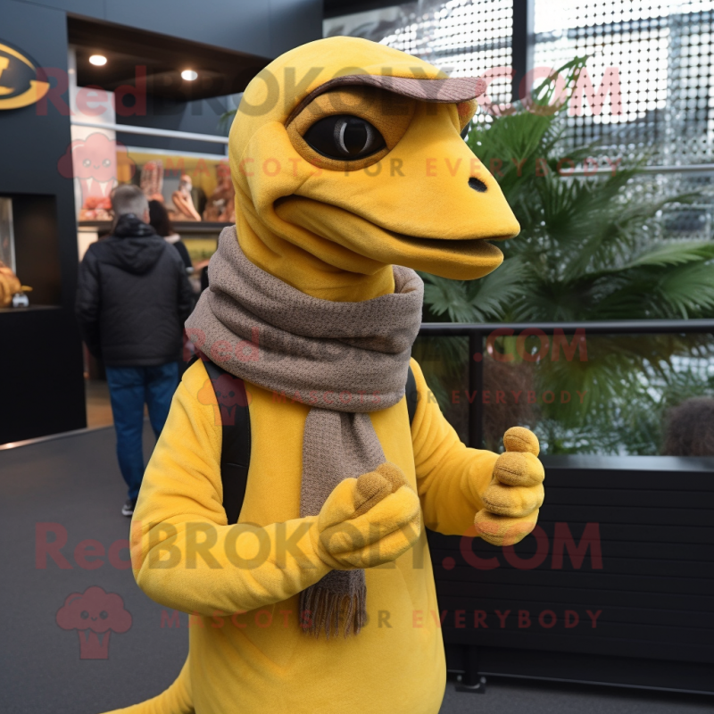 Yellow Deinonychus mascot costume character dressed with a Turtleneck and Beanies Yellow Deinonychus mascot costume character dressed with a Turtleneck and Beanies