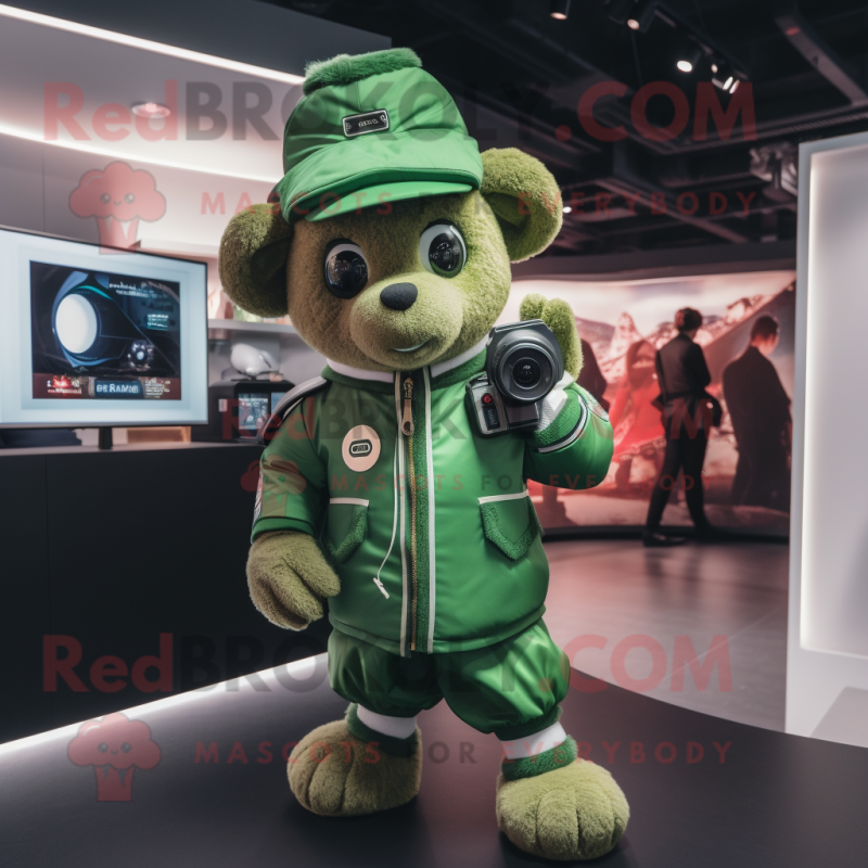 Green Camera mascot costume character dressed with a Bomber Jacket and Keychains Green Camera mascot costume character dressed with a Bomber Jacket and Keychains