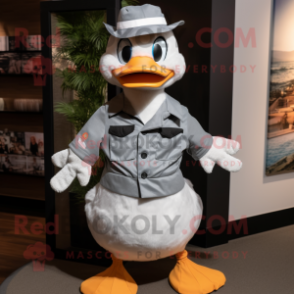 Gray Duck mascot costume character dressed with a Poplin Shirt and Suspenders