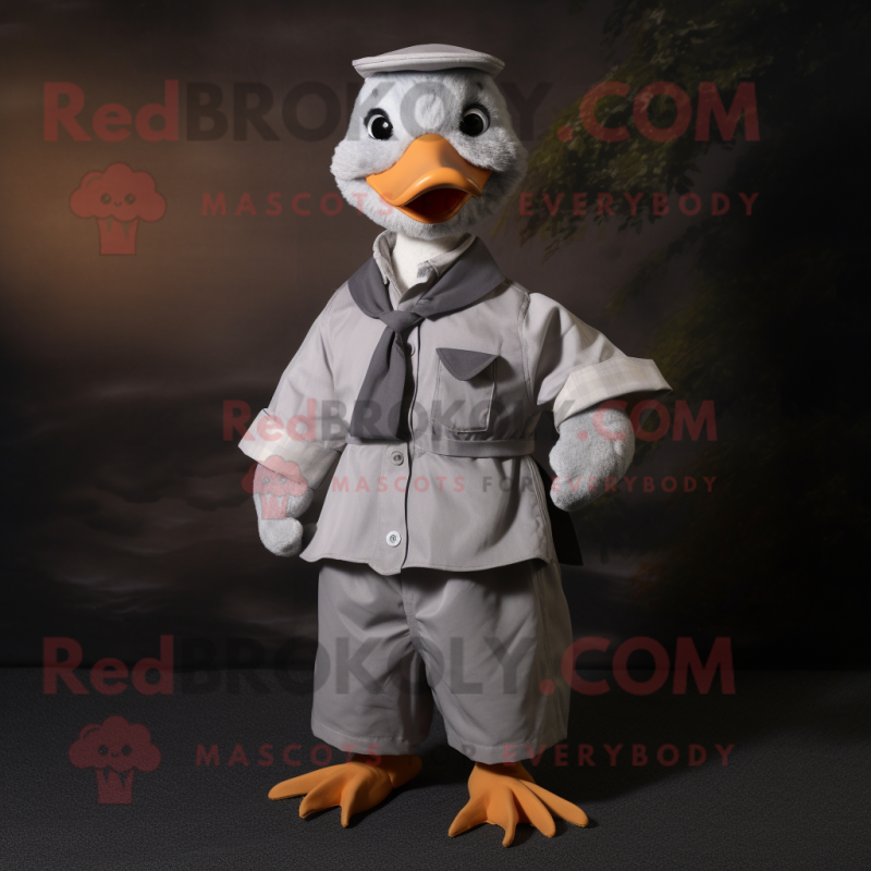Gray Duck mascot costume character dressed with a Poplin Shirt and Suspenders