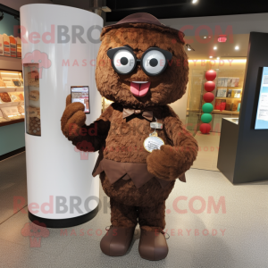 Brown Candy mascot costume character dressed with a Henley Shirt and Reading glasses