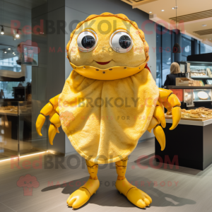 Gold Crab Cakes mascot costume character dressed with a Swimwear and Shawls