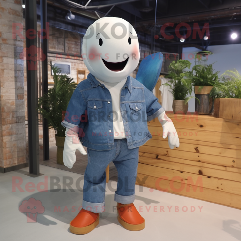 Rust Beluga Whale mascot costume character dressed with a Chambray Shirt and Shoe laces
