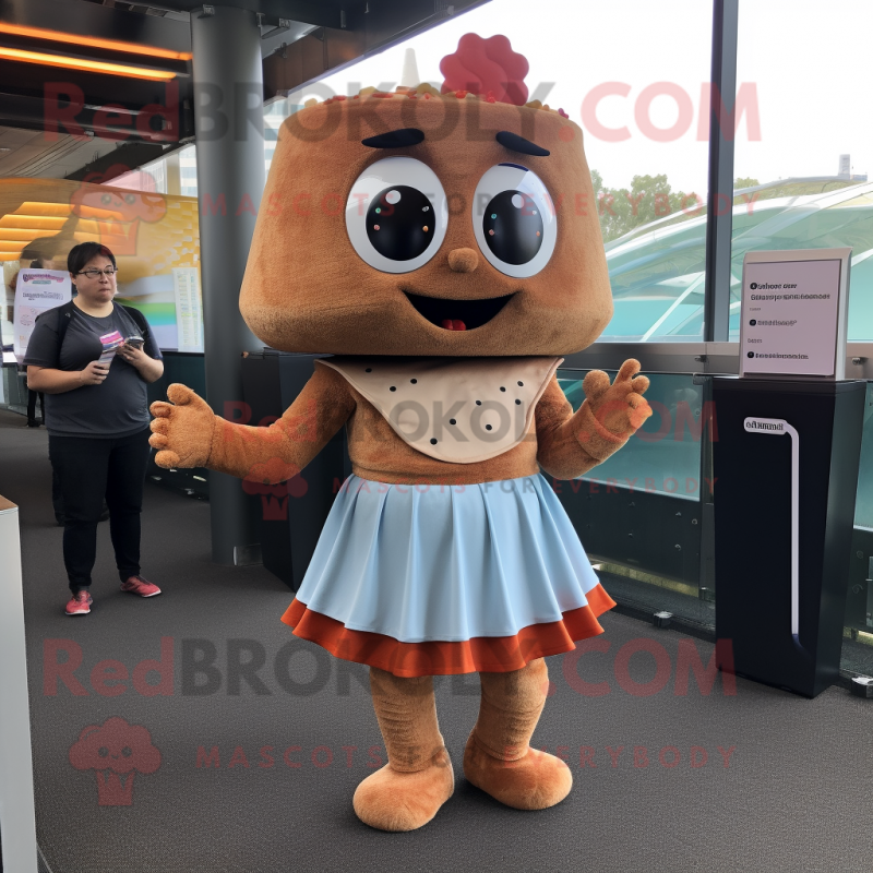 Rust Cupcake mascot costume character dressed with a Mini Skirt and Suspenders