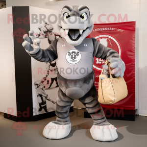 Gray Hydra mascot costume character dressed with a Rugby Shirt and Tote bags