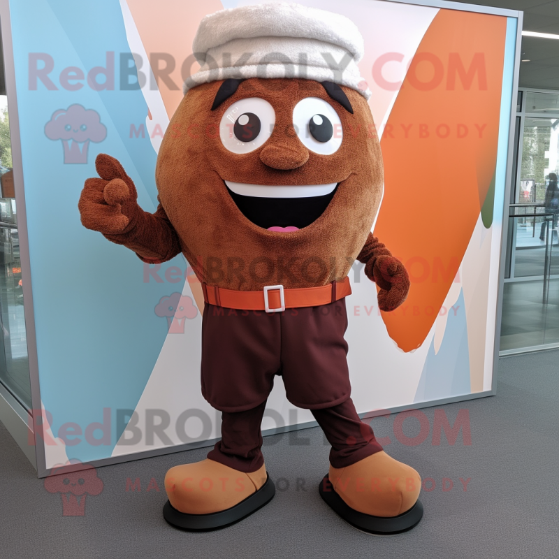 Rust Cupcake mascot costume character dressed with a Dress Pants and Shoe laces