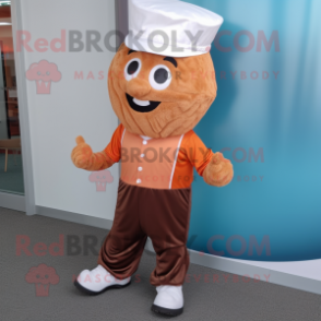 Rust Cupcake mascot costume character dressed with a Dress Pants and Shoe laces