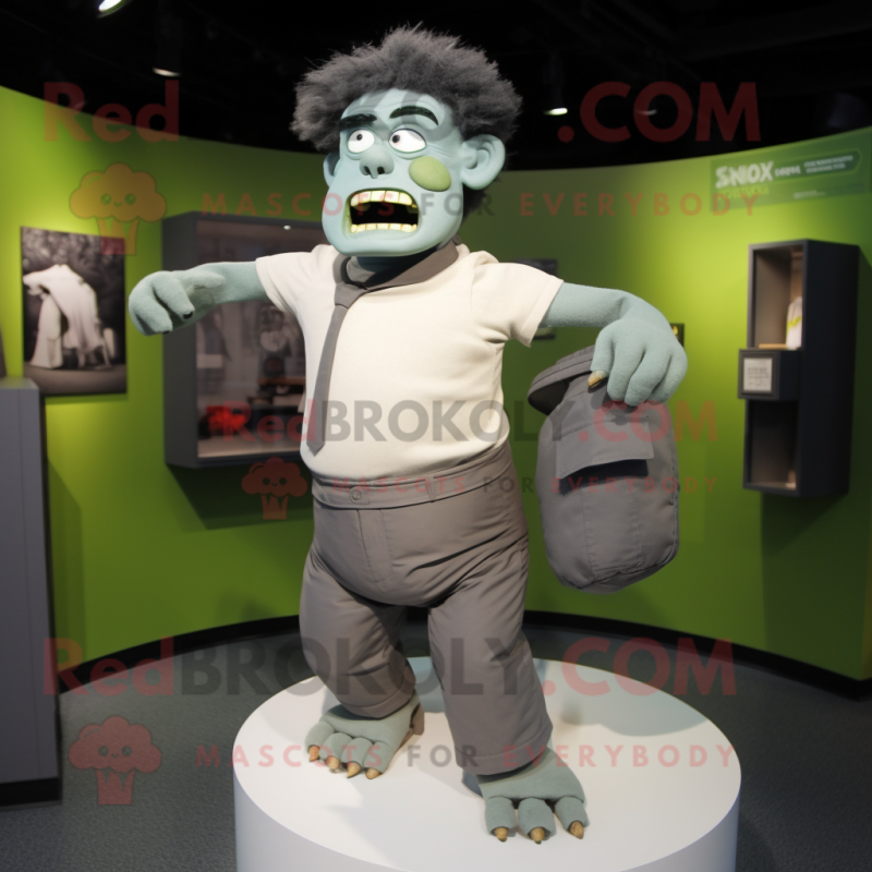 Gray Frankenstein'S Monster mascot costume character dressed with a Henley Tee and Cummerbunds