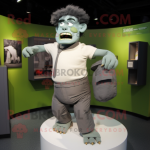 Gray Frankenstein'S Monster mascot costume character dressed with a Henley Tee and Cummerbunds