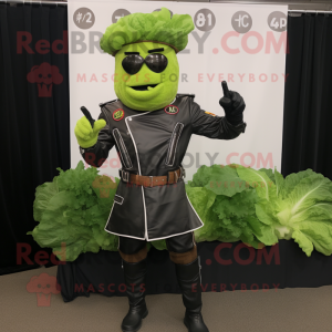 Green Caesar Salad mascot costume character dressed with a Biker Jacket and Belts