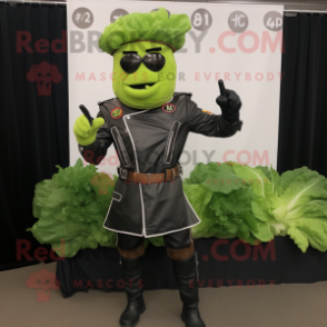Green Caesar Salad mascot costume character dressed with a Biker Jacket and Belts