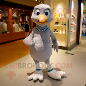 Gray Albatross mascot costume character dressed with a Polo Tee and Shoe laces