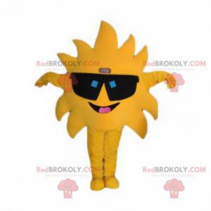 Mascote gigante do sol amarelo com óculos pretos -
