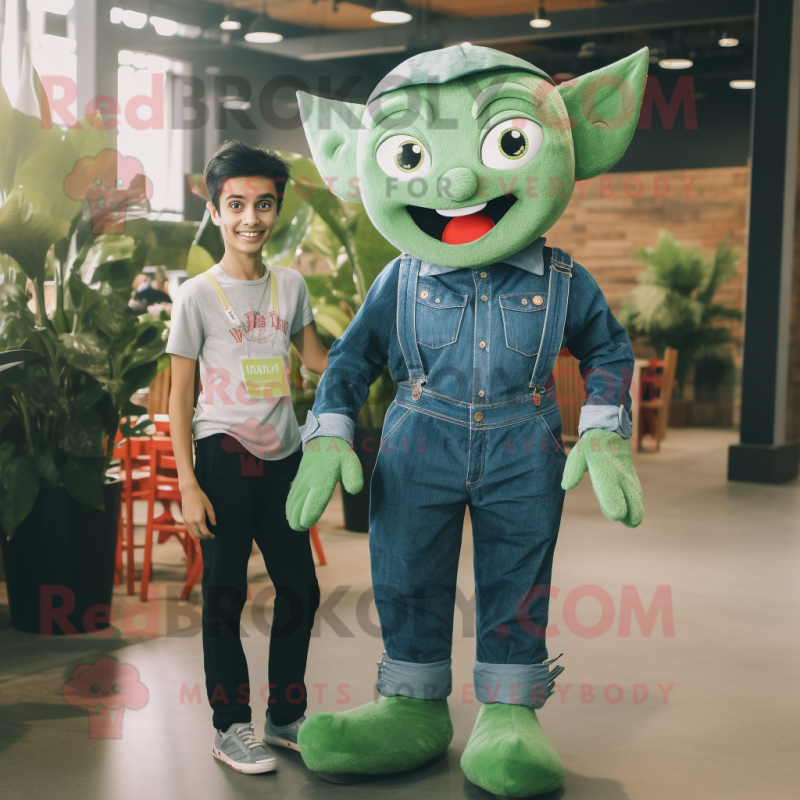 Forest Green Tooth Fairy mascot costume character dressed with a Denim Shirt and Cummerbunds Forest Green Tooth Fairy mascot costume character dressed with a Denim Shirt and Cummerbunds