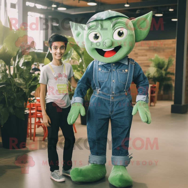 Forest Green Tooth Fairy mascot costume character dressed with a Denim Shirt and Cummerbunds