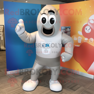 Silver Boxing Glove mascot costume character dressed with a Swimwear and Shoe laces