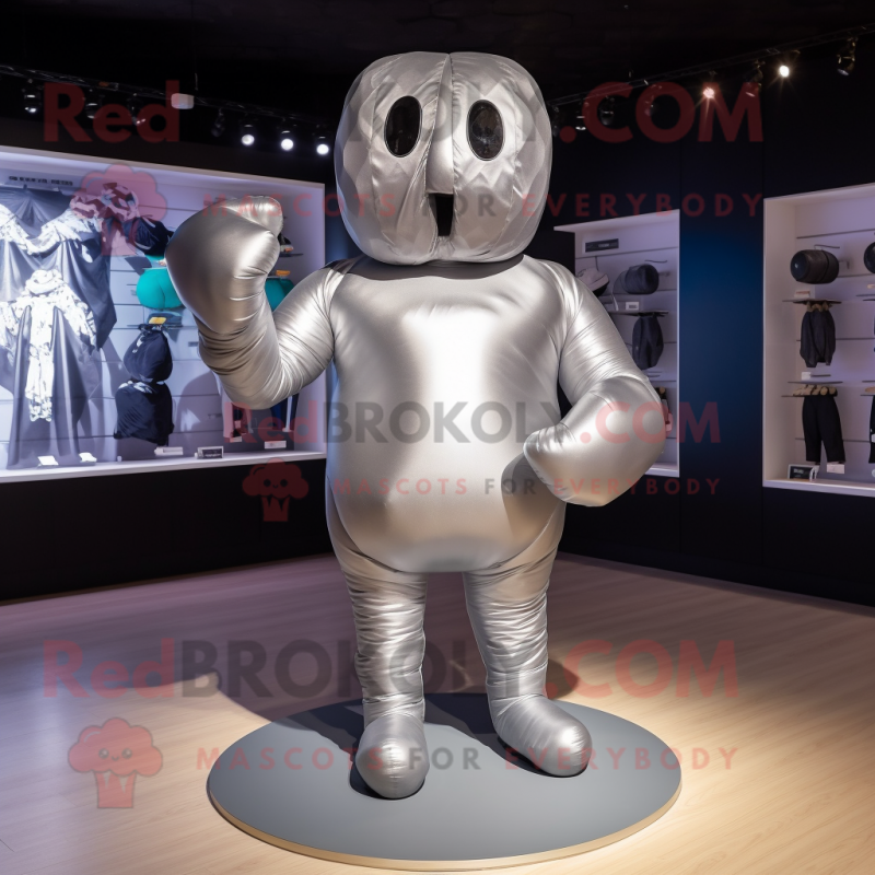 Silver Boxing Glove mascot costume character dressed with a Swimwear and Shoe laces Silver Boxing Glove mascot costume character dressed with a Swimwear and Shoe laces