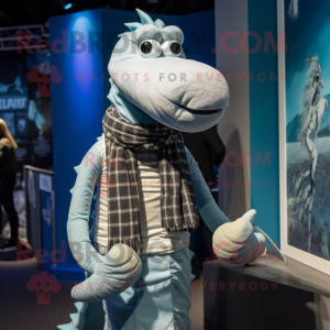 Silver Loch Ness Monster mascot costume character dressed with a Graphic Tee and Scarves