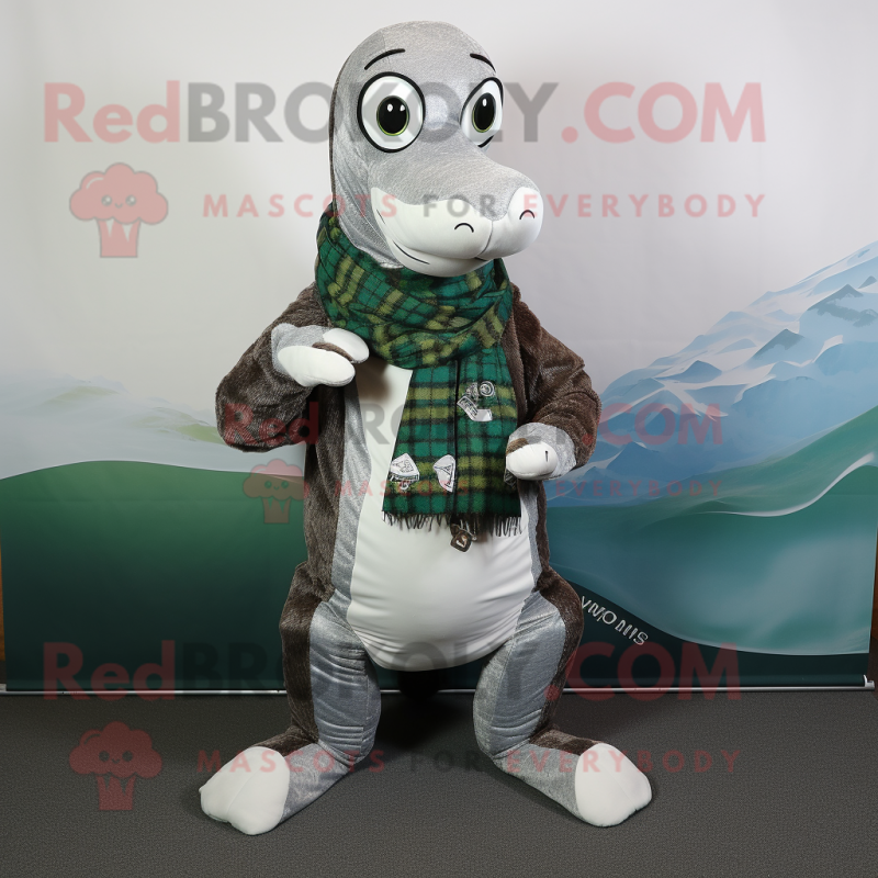 Silver Loch Ness Monster mascot costume character dressed with a Graphic Tee and Scarves