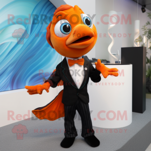 Orange Betta Fish mascot costume character dressed with a Tuxedo and Ties