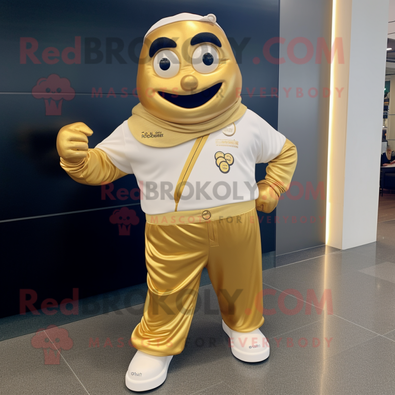 Gold Moussaka mascot costume character dressed with a Joggers and Belts Gold Moussaka mascot costume character dressed with a Joggers and Belts