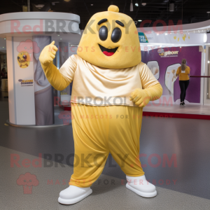 Gold Moussaka mascot costume character dressed with a Joggers and Belts
