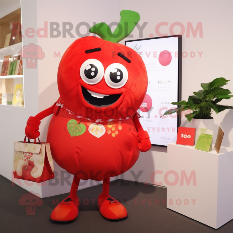 nan Tomato mascot costume character dressed with a Graphic Tee and Clutch bags nan Tomato mascot costume character dressed with a Graphic Tee and Clutch bags