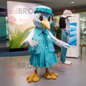 Turquoise Albatross mascot costume character dressed with a A-Line Dress and Berets