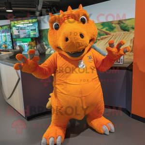 Orange Ankylosaurus mascot costume character dressed with a Henley Tee and Wraps