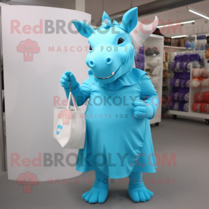 Cyan Rhinoceros mascot costume character dressed with a Dress and Tote bags