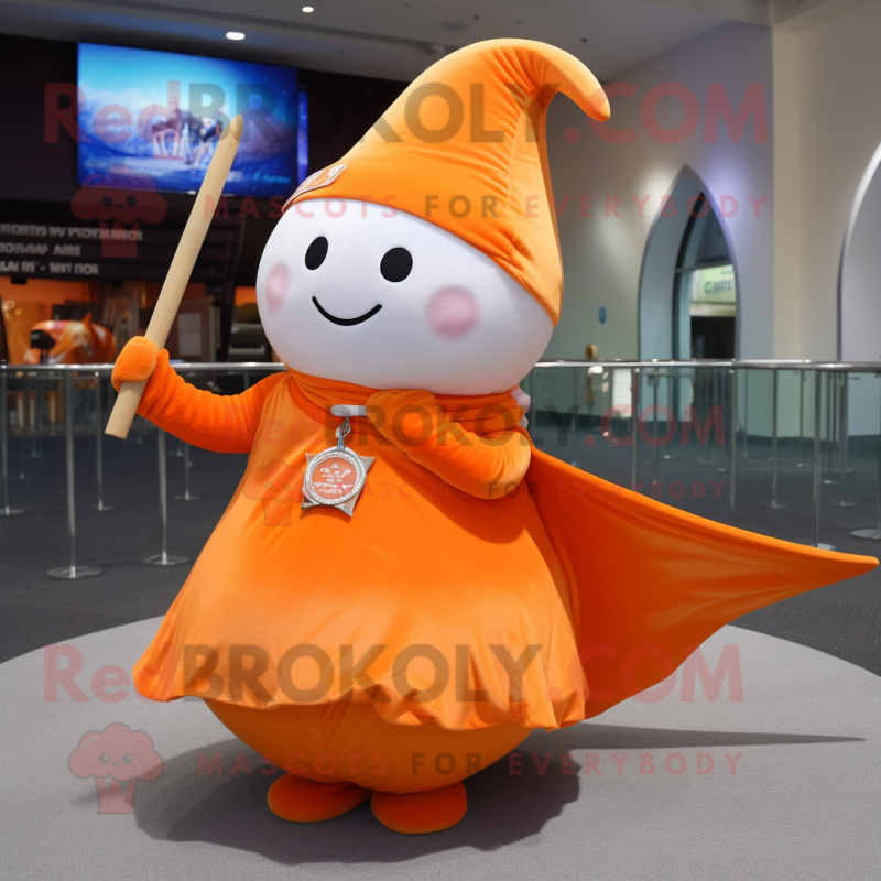 Orange Narwhal mascot costume character dressed with a Wrap Skirt and Rings Orange Narwhal mascot costume character dressed with a Wrap Skirt and Rings